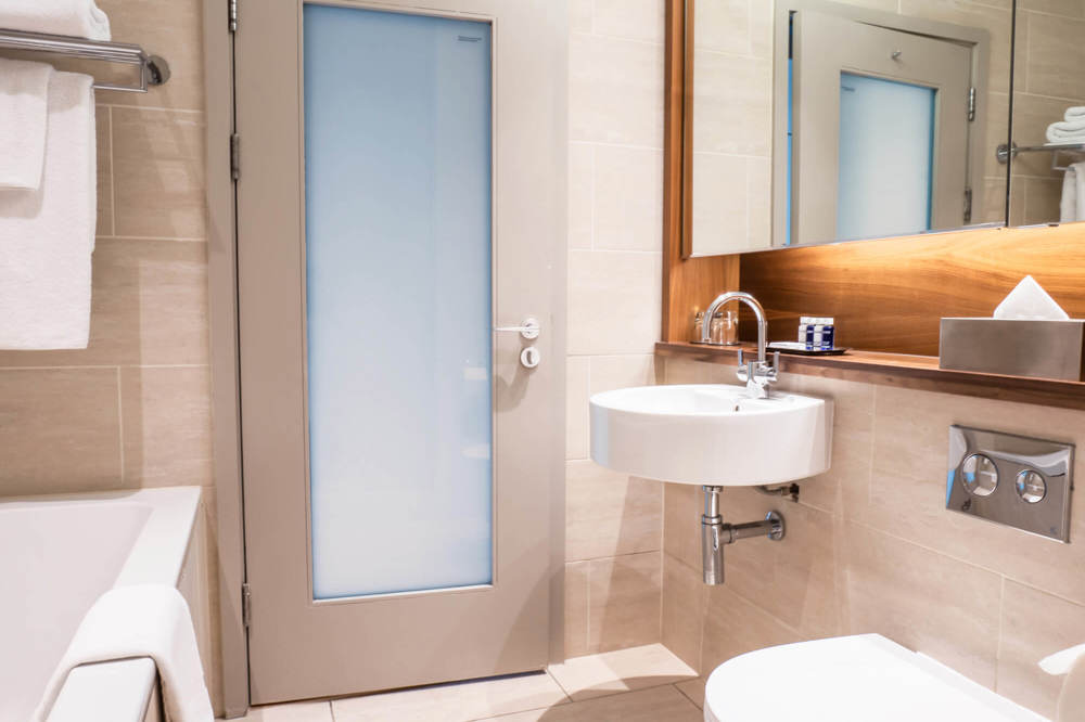 City Room bathroom with bath at Apex Waterloo Place Hotel