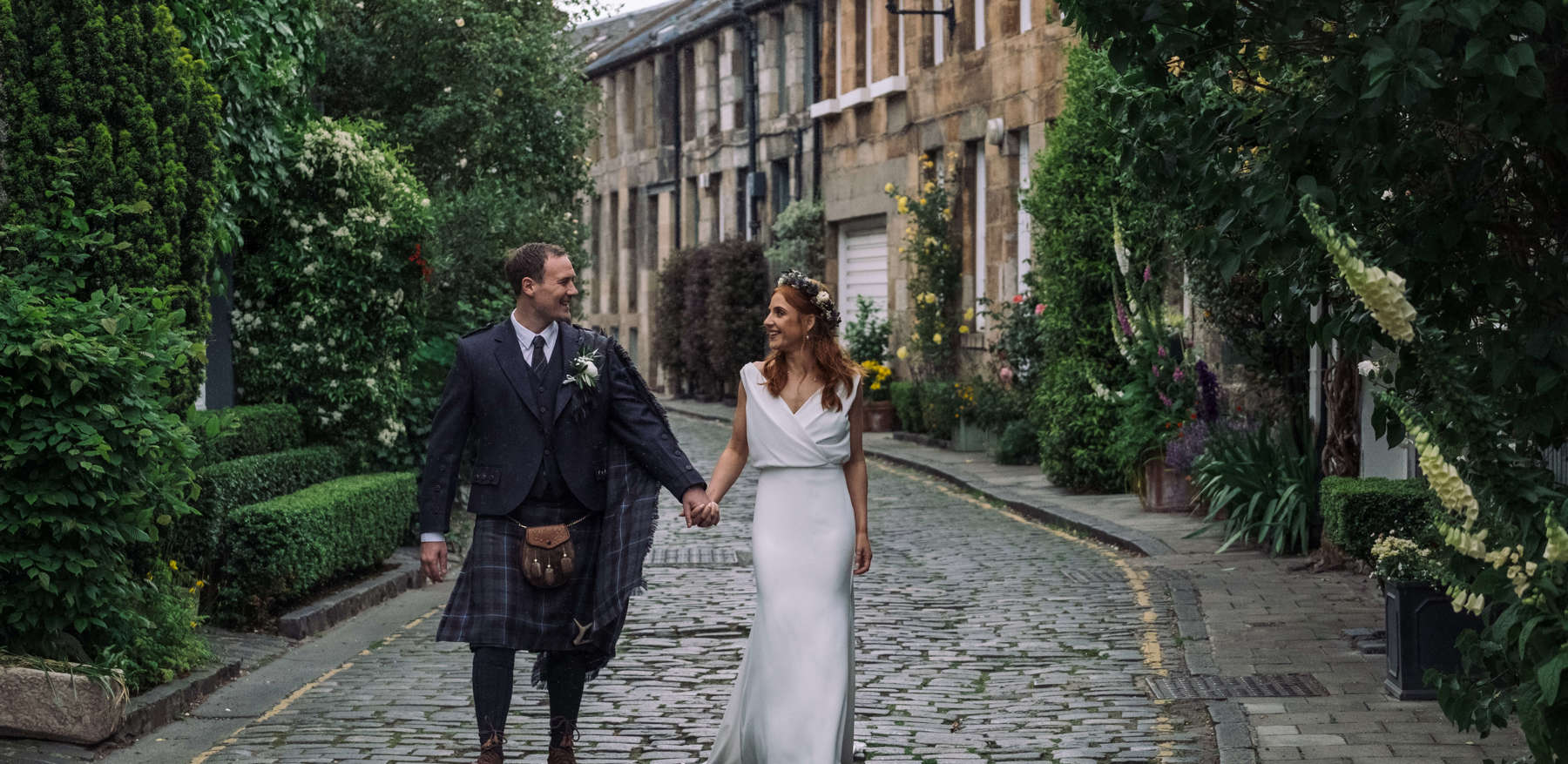 Bride and Groom walking hand in hand