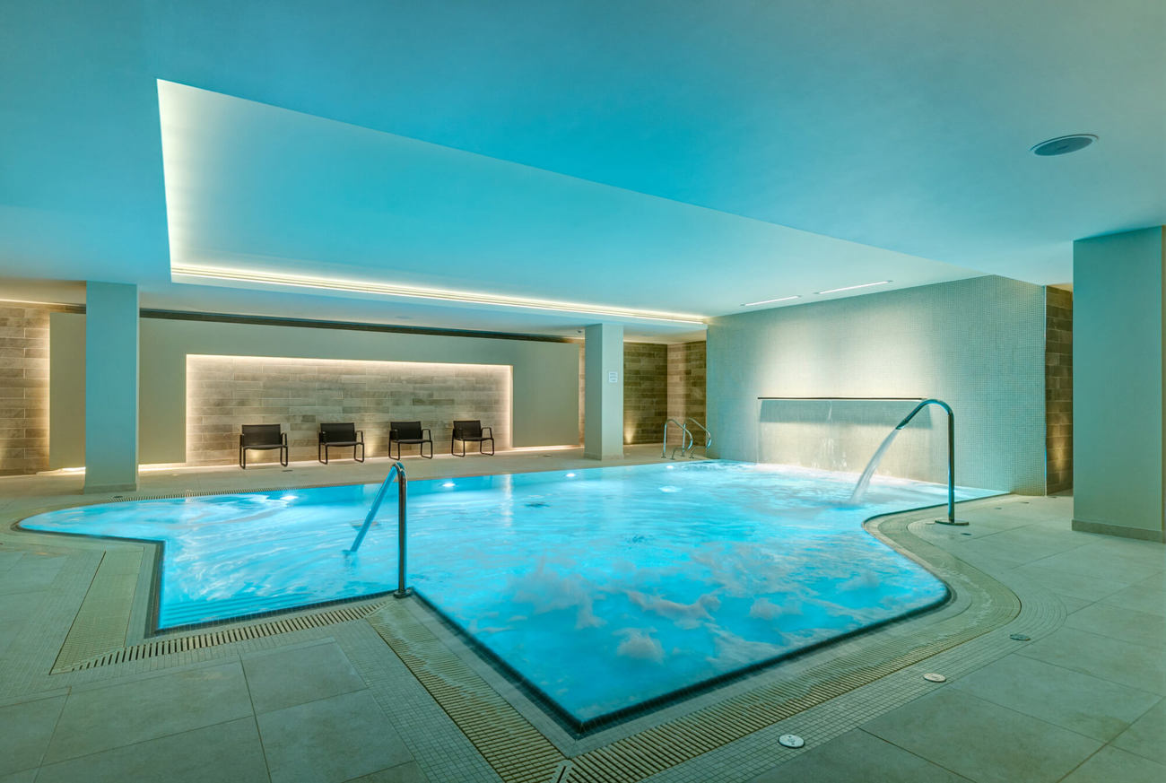 Indoor swimming pool at Apex City of Bath Hotel