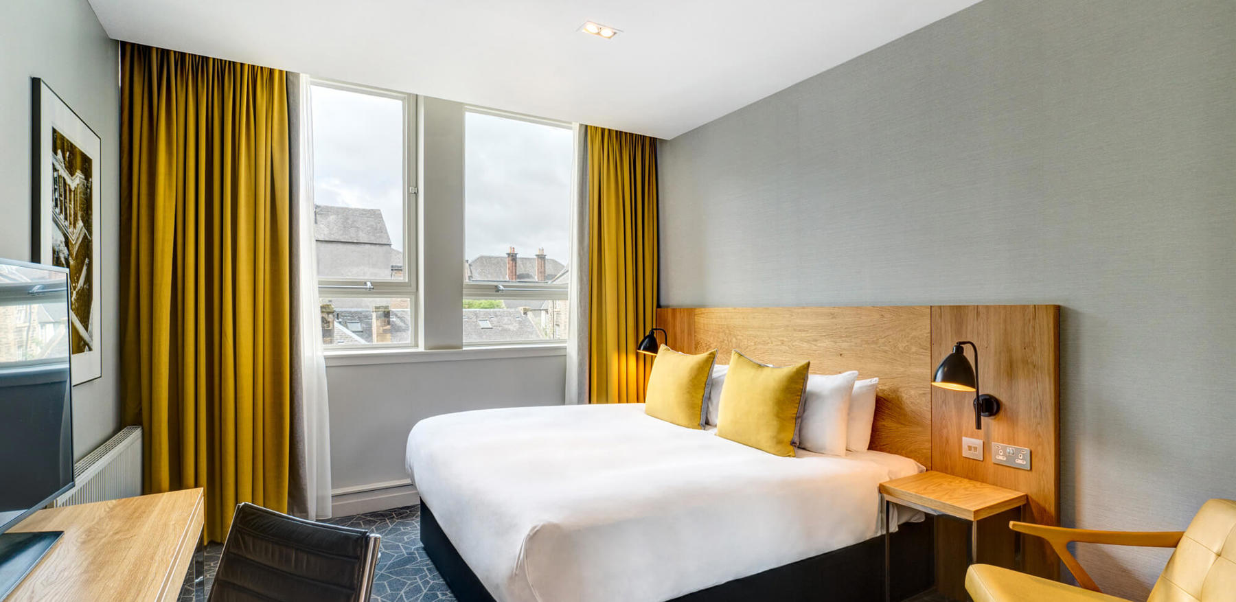 City Room with queen-size bed and desk at Apex Grassmarket Hotel