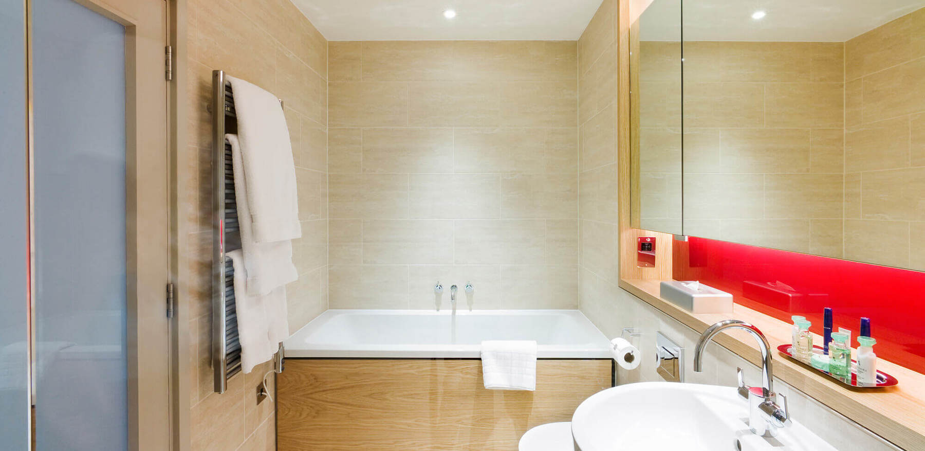 Bathroom with bath in Junior Suite at Apex Temple Court Hotel