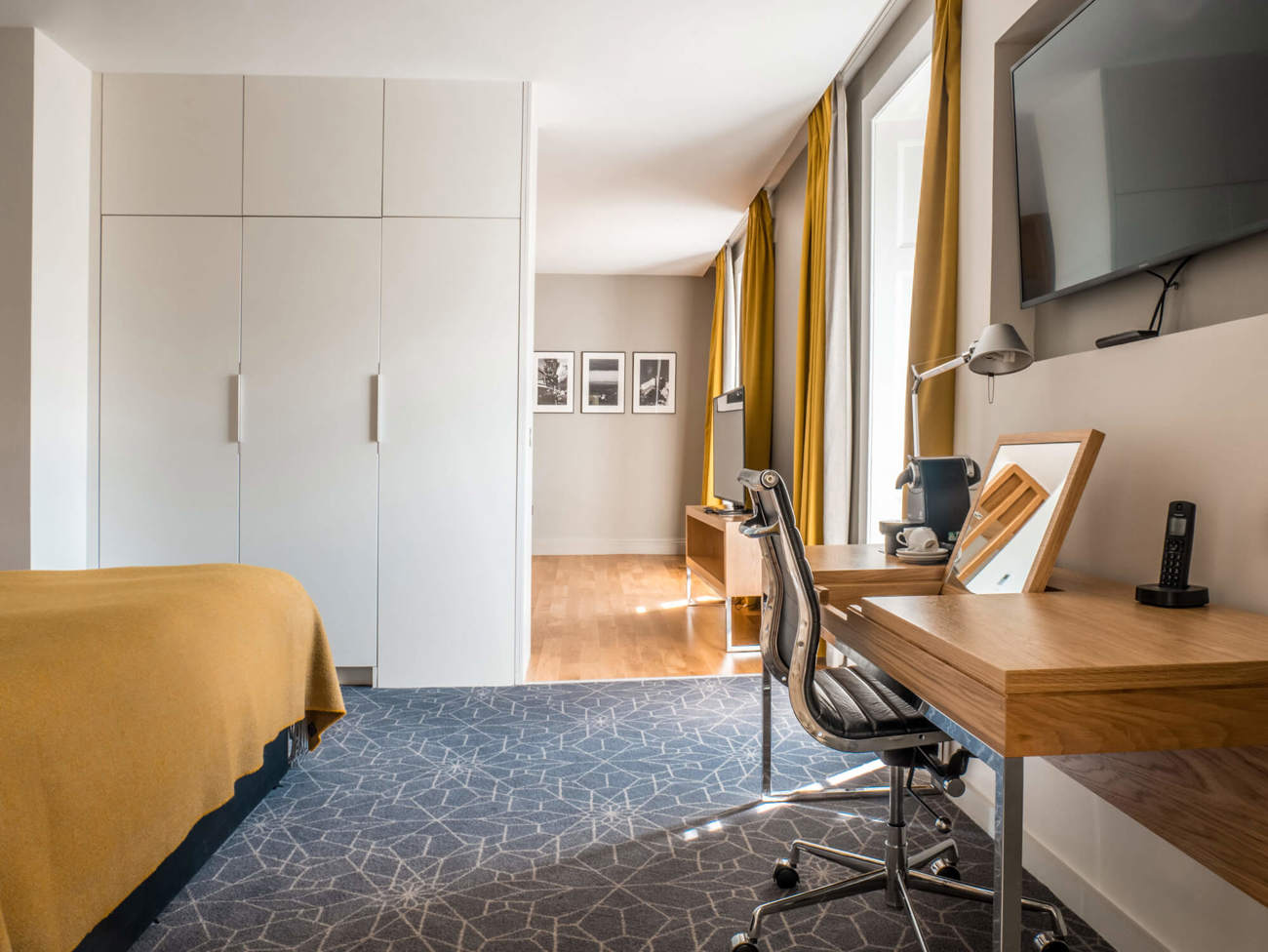 Master Suite work space area with desk at Apex Waterloo Place Hotel