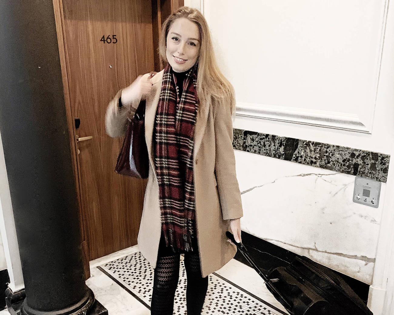 Blogger Milly London outside the Grand Suite