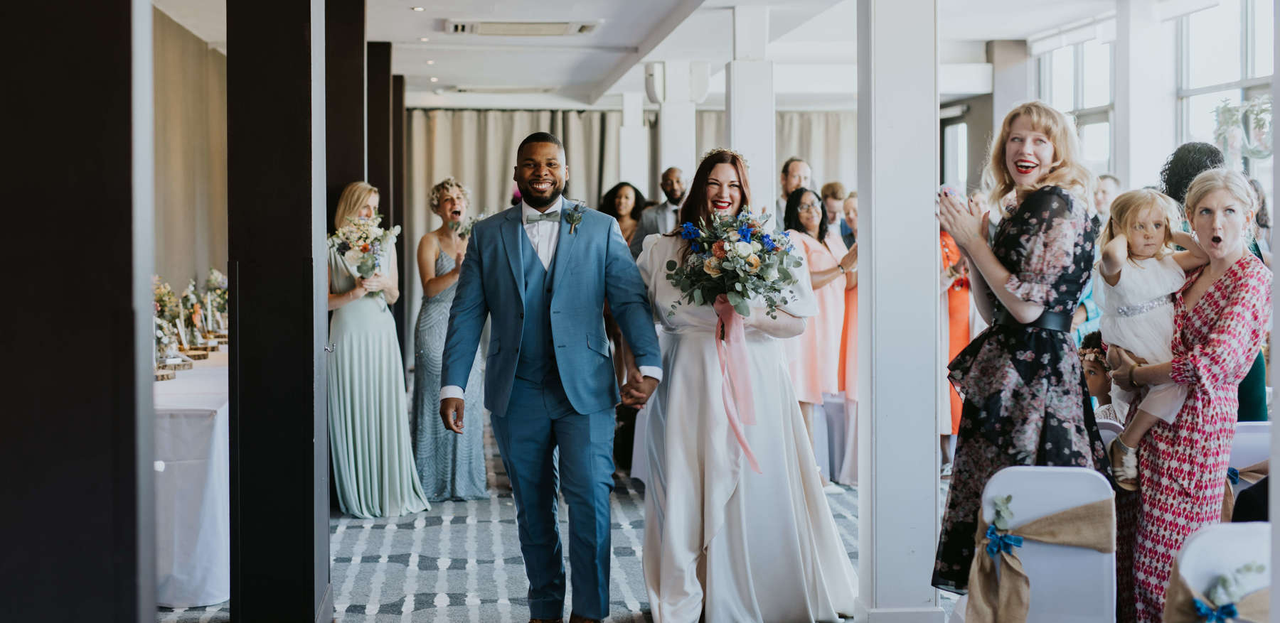 Couple Walking Back Up The Aisle