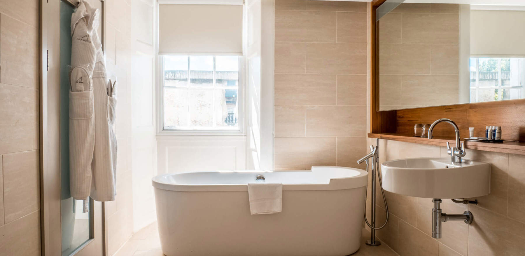 Master Suite bathroom with free standing bathtub at Apex Waterloo Place Hotel