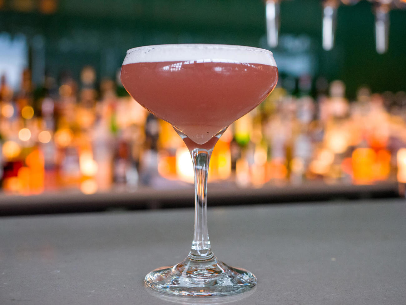 Pink martini cocktail on bar at Quayside Bar & Grill