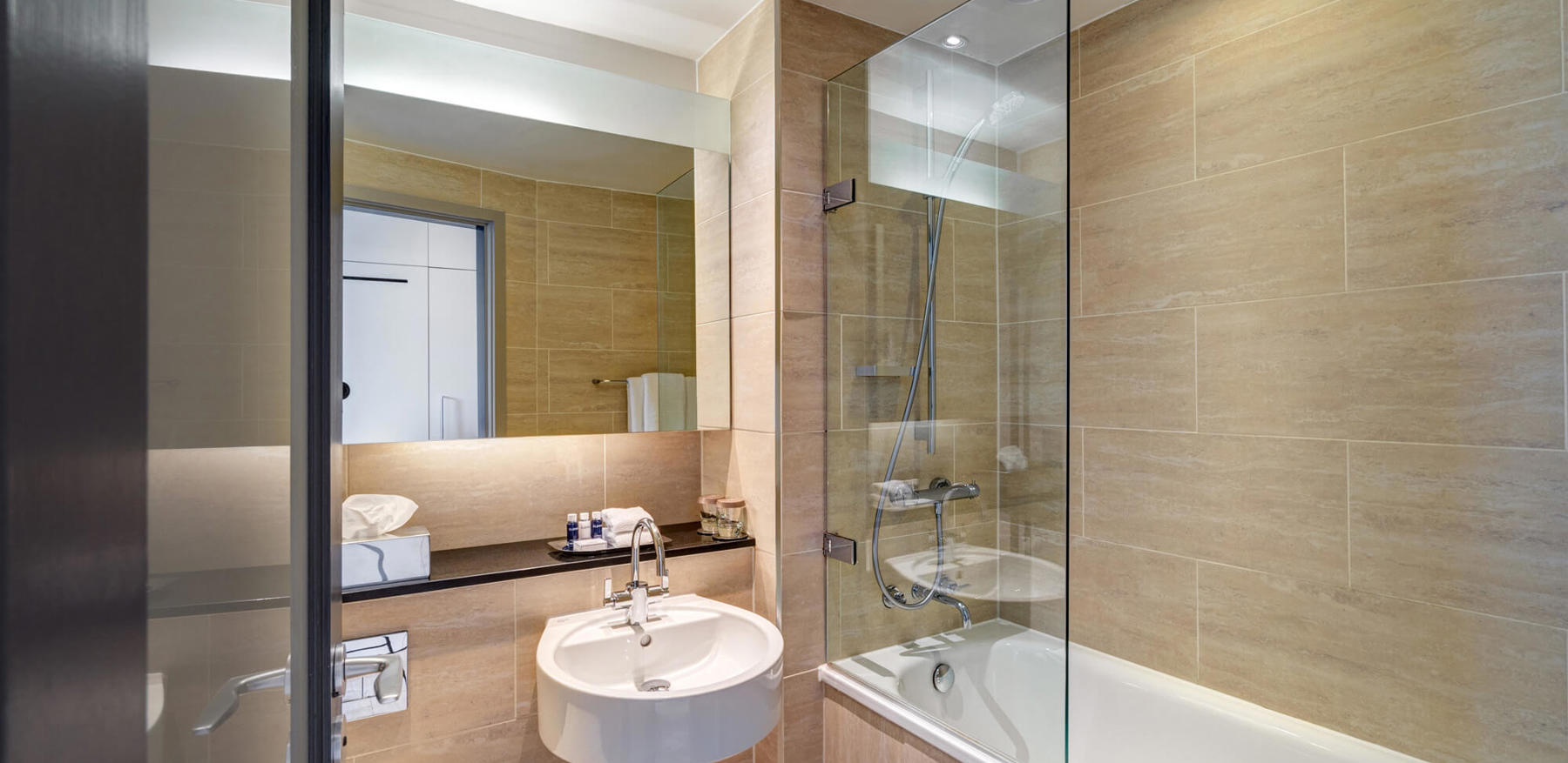 City Room bathroom with shower over bath at Apex Grassmarket Hotel