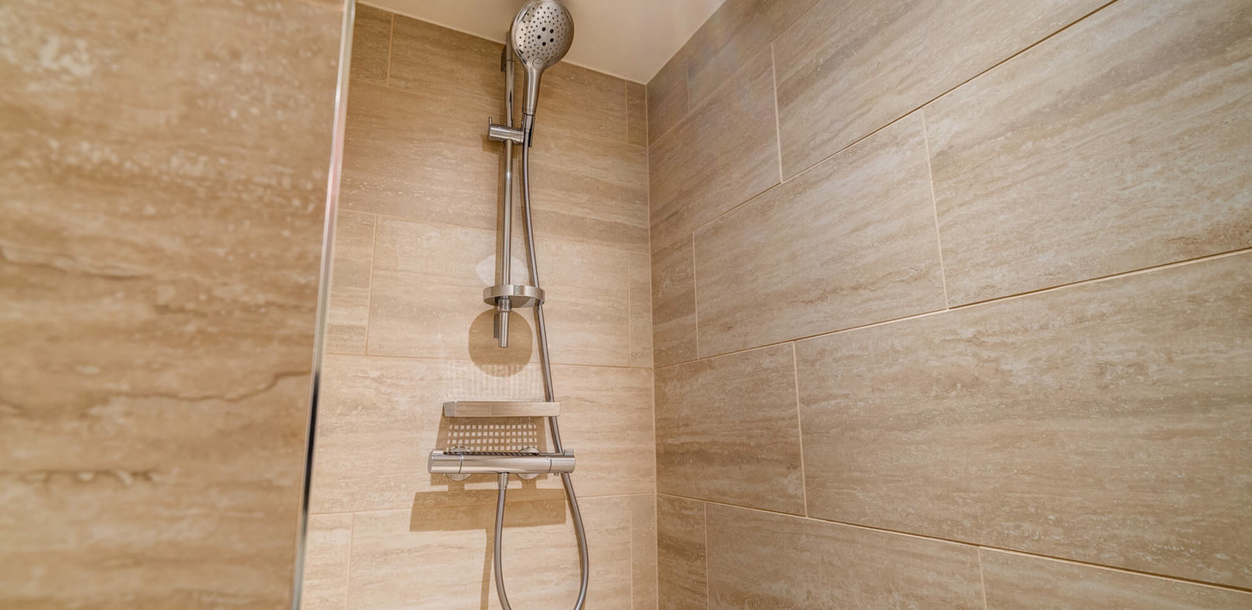 Castle View Deluxe Room with Balcony bathroom with shower over bath at Apex Grassmarket Hotel