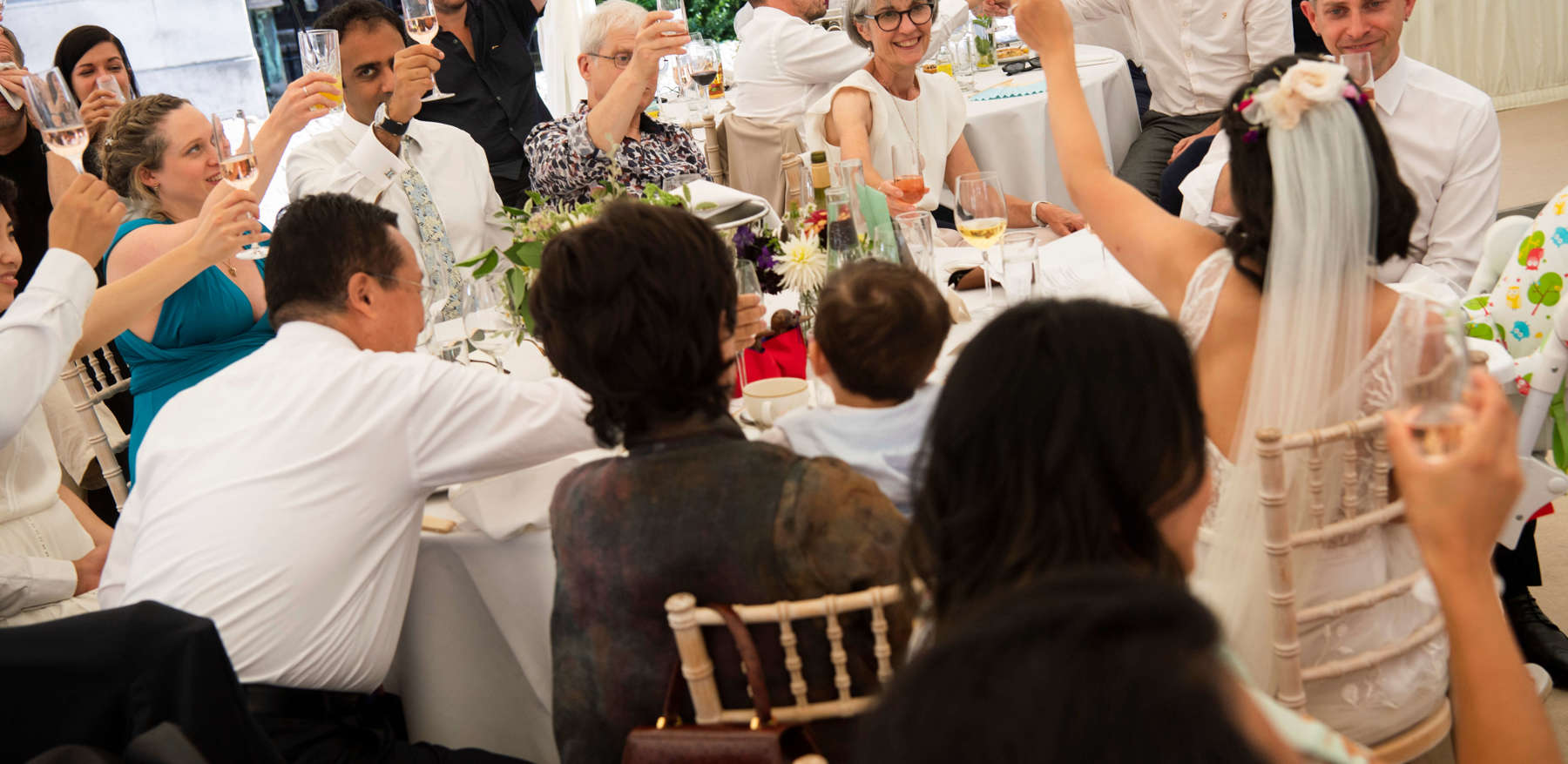 Wedding guests cheering