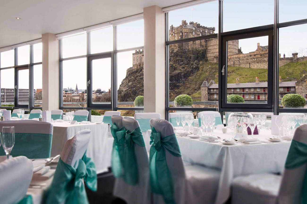 Heights at Apex Grassmarket Hotel set up for wedding with view of Edinburgh Castle