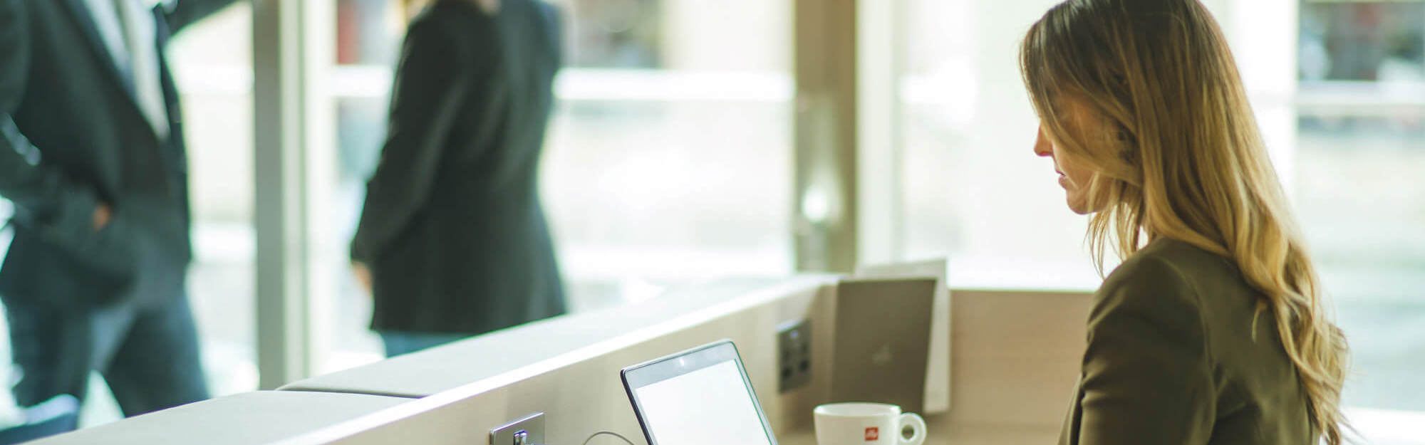 Female business traveller on laptop