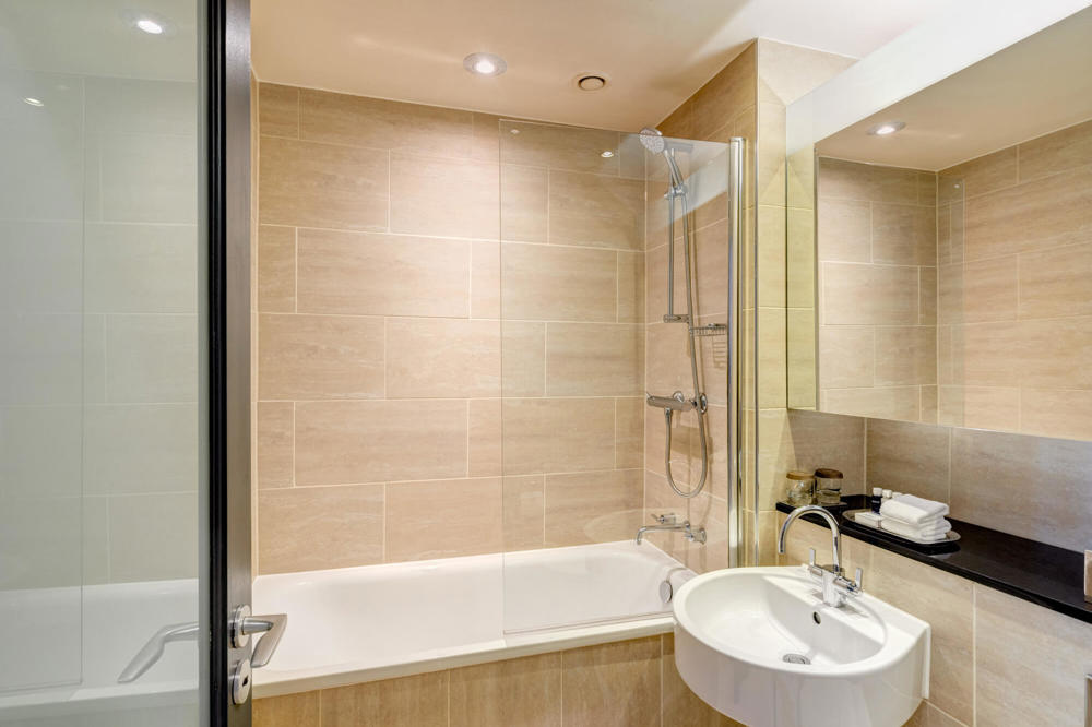 Castle View Superior Room bathroom with shower over bath at Apex Grassmarket HotelCastle View Superior Room bathroom with shower over bath at Apex Grassmarket Hotel